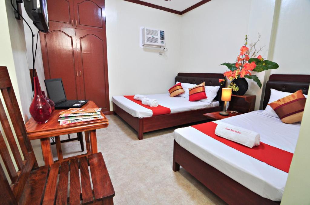 Jilian Tourist Inn Puerto Princesa Δωμάτιο φωτογραφία
